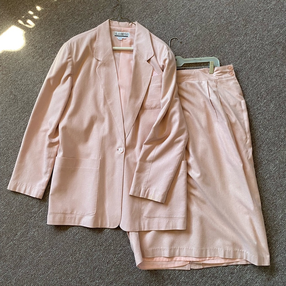 Matching light pink blazer and skirt